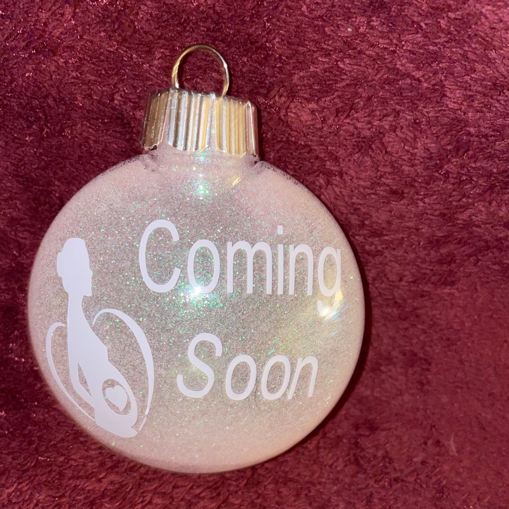 Light pink disc shaped coming soon ornament